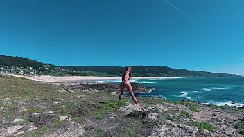 Pornstar Russian Girl Sasha Bikeyeva - Spain Galicia beach Doninos. Perfect body naked nudist girl teasing and dancing on the coast of the Atlantic Ocean